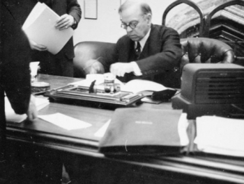 Prime Minister Mackenzie King signing the British Commonwealth Air Training Plan, 17 December 1939.